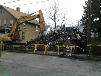 Crews Begin Tearing Down City House Following Fire