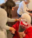 Butler Radio’s ‘Project Poinsettia’ Brings Christmas Cheer To Local Nursing Homes